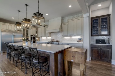 A STORYBOOK HOME ON TELLICO LAKE. 

Tucked into the scenic on Tellico Village -The Links At Kahite Golf Course in Tennessee - for sale on GolfHomes.com, golf home, golf lot