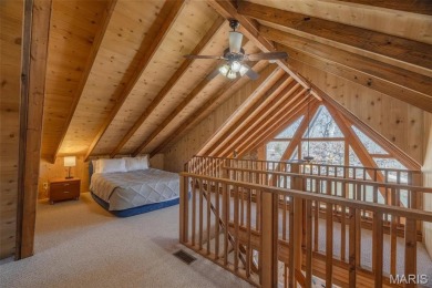 Private setting on lake Silveratta,  newer style custom chalet on Innsbrook Resort Golf Course in Missouri - for sale on GolfHomes.com, golf home, golf lot