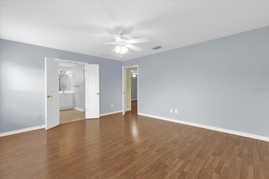 Welcome to this beautifully maintained Challedon model home in on Eagle Ridge At Spruce Creek Country Club in Florida - for sale on GolfHomes.com, golf home, golf lot