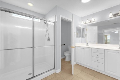 Welcome to this beautifully maintained Challedon model home in on Eagle Ridge At Spruce Creek Country Club in Florida - for sale on GolfHomes.com, golf home, golf lot