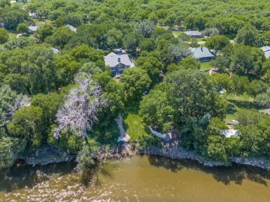 This River Front House Has It All.  Single Story Ranch Home on Pecan Plantation Country Club in Texas - for sale on GolfHomes.com, golf home, golf lot