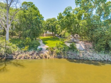 This River Front House Has It All.  Single Story Ranch Home on Pecan Plantation Country Club in Texas - for sale on GolfHomes.com, golf home, golf lot