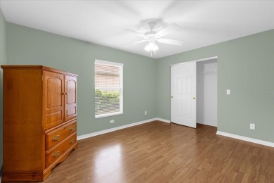 Welcome to this beautifully maintained Challedon model home in on Eagle Ridge At Spruce Creek Country Club in Florida - for sale on GolfHomes.com, golf home, golf lot