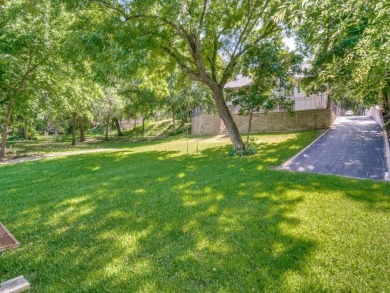 This River Front House Has It All.  Single Story Ranch Home on Pecan Plantation Country Club in Texas - for sale on GolfHomes.com, golf home, golf lot