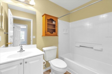 Welcome to this beautifully maintained Challedon model home in on Eagle Ridge At Spruce Creek Country Club in Florida - for sale on GolfHomes.com, golf home, golf lot