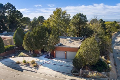 Stately comfort of parquet floors, gorgeous wood wall den w/gas on The Canyon Club in New Mexico - for sale on GolfHomes.com, golf home, golf lot