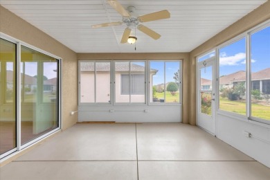 Welcome to this beautifully maintained Challedon model home in on Eagle Ridge At Spruce Creek Country Club in Florida - for sale on GolfHomes.com, golf home, golf lot