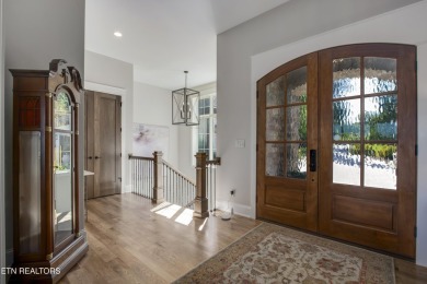 A STORYBOOK HOME ON TELLICO LAKE. 

Tucked into the scenic on Tellico Village -The Links At Kahite Golf Course in Tennessee - for sale on GolfHomes.com, golf home, golf lot