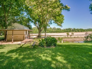 This River Front House Has It All.  Single Story Ranch Home on Pecan Plantation Country Club in Texas - for sale on GolfHomes.com, golf home, golf lot