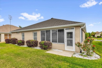 Welcome to this beautifully maintained Challedon model home in on Eagle Ridge At Spruce Creek Country Club in Florida - for sale on GolfHomes.com, golf home, golf lot