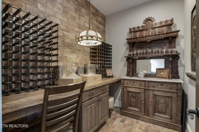 A STORYBOOK HOME ON TELLICO LAKE. 

Tucked into the scenic on Tellico Village -The Links At Kahite Golf Course in Tennessee - for sale on GolfHomes.com, golf home, golf lot