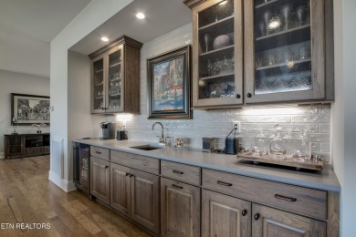 A STORYBOOK HOME ON TELLICO LAKE. 

Tucked into the scenic on Tellico Village -The Links At Kahite Golf Course in Tennessee - for sale on GolfHomes.com, golf home, golf lot