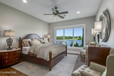 A STORYBOOK HOME ON TELLICO LAKE. 

Tucked into the scenic on Tellico Village -The Links At Kahite Golf Course in Tennessee - for sale on GolfHomes.com, golf home, golf lot