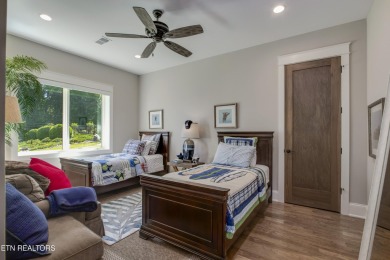 A STORYBOOK HOME ON TELLICO LAKE. 

Tucked into the scenic on Tellico Village -The Links At Kahite Golf Course in Tennessee - for sale on GolfHomes.com, golf home, golf lot