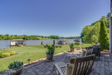 A STORYBOOK HOME ON TELLICO LAKE. 

Tucked into the scenic on Tellico Village -The Links At Kahite Golf Course in Tennessee - for sale on GolfHomes.com, golf home, golf lot