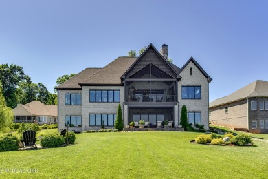 A STORYBOOK HOME ON TELLICO LAKE. 

Tucked into the scenic on Tellico Village -The Links At Kahite Golf Course in Tennessee - for sale on GolfHomes.com, golf home, golf lot