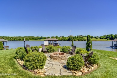 A STORYBOOK HOME ON TELLICO LAKE. 

Tucked into the scenic on Tellico Village -The Links At Kahite Golf Course in Tennessee - for sale on GolfHomes.com, golf home, golf lot