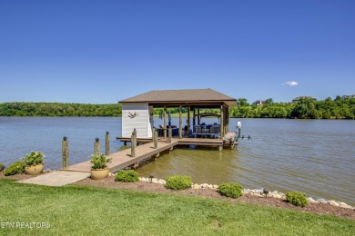A STORYBOOK HOME ON TELLICO LAKE. 

Tucked into the scenic on Tellico Village -The Links At Kahite Golf Course in Tennessee - for sale on GolfHomes.com, golf home, golf lot