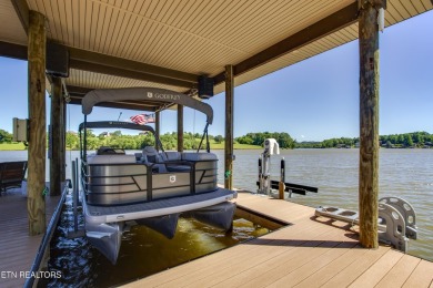 A STORYBOOK HOME ON TELLICO LAKE. 

Tucked into the scenic on Tellico Village -The Links At Kahite Golf Course in Tennessee - for sale on GolfHomes.com, golf home, golf lot