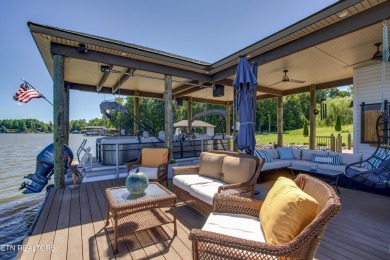 A STORYBOOK HOME ON TELLICO LAKE. 

Tucked into the scenic on Tellico Village -The Links At Kahite Golf Course in Tennessee - for sale on GolfHomes.com, golf home, golf lot