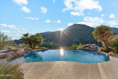 Nestled in the exclusive Solitude Canyon enclave within on Eagle Mountain Golf Club in Arizona - for sale on GolfHomes.com, golf home, golf lot