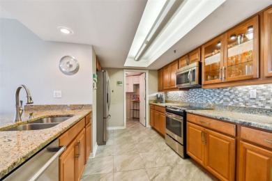 TURNKEY with GOLF & WATERFRONT VIEWS -- This beautifully on Isla Del Sol Yacht and Country Club in Florida - for sale on GolfHomes.com, golf home, golf lot
