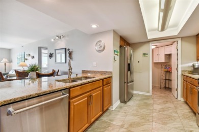 TURNKEY with GOLF & WATERFRONT VIEWS -- This beautifully on Isla Del Sol Yacht and Country Club in Florida - for sale on GolfHomes.com, golf home, golf lot