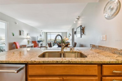 TURNKEY with GOLF & WATERFRONT VIEWS -- This beautifully on Isla Del Sol Yacht and Country Club in Florida - for sale on GolfHomes.com, golf home, golf lot