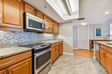 TURNKEY with GOLF & WATERFRONT VIEWS -- This beautifully on Isla Del Sol Yacht and Country Club in Florida - for sale on GolfHomes.com, golf home, golf lot