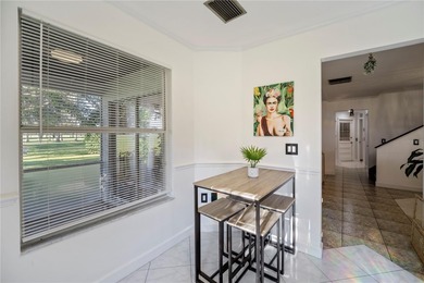 Enjoy some of the BEST VIEWS from this SPACIOUS GOLF-FRONT VILLA on Wedgefield Golf Club in Florida - for sale on GolfHomes.com, golf home, golf lot