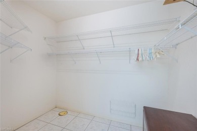 In addition to the 1,630 s/f under air, this attractive 2BR/2BA on Riviera Golf Club in Florida - for sale on GolfHomes.com, golf home, golf lot