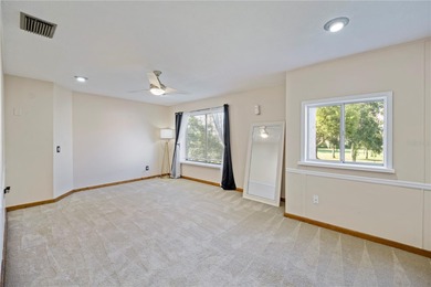 Enjoy some of the BEST VIEWS from this SPACIOUS GOLF-FRONT VILLA on Wedgefield Golf Club in Florida - for sale on GolfHomes.com, golf home, golf lot