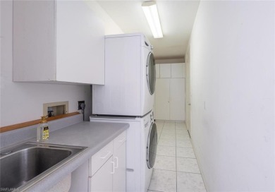 In addition to the 1,630 s/f under air, this attractive 2BR/2BA on Riviera Golf Club in Florida - for sale on GolfHomes.com, golf home, golf lot