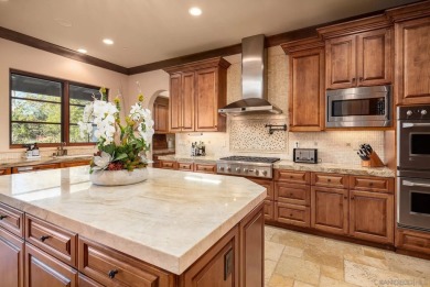 Welcome to 7552 Montien Road, a refined single-story estate on The Santaluz Club in California - for sale on GolfHomes.com, golf home, golf lot