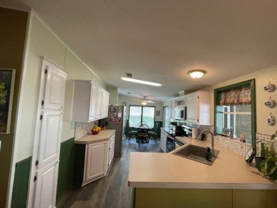 Listed by the Official Sales Team of Cypress Lakes Village on Big Cypress Golf and Country Club in Florida - for sale on GolfHomes.com, golf home, golf lot