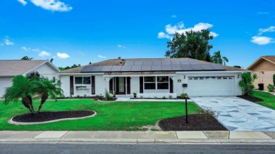 Move-in ready with owned solar (low bills), a private Swim Spa on North Lakes Golf Course in Florida - for sale on GolfHomes.com, golf home, golf lot