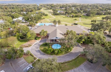 Under contract-accepting backup offers. WOW, ONE OF THE BEST on Harbor Hills Country Club in Florida - for sale on GolfHomes.com, golf home, golf lot
