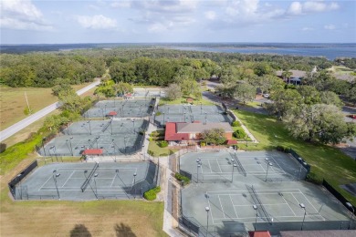Under contract-accepting backup offers. WOW, ONE OF THE BEST on Harbor Hills Country Club in Florida - for sale on GolfHomes.com, golf home, golf lot