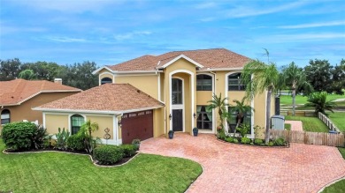 LOCATED ON THE 4TH HOLE IN THE GOLF COURSE COMMUNITY OF on Summerfield Crossing Golf Club in Florida - for sale on GolfHomes.com, golf home, golf lot