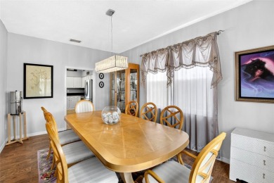 LOCATED ON THE 4TH HOLE IN THE GOLF COURSE COMMUNITY OF on Summerfield Crossing Golf Club in Florida - for sale on GolfHomes.com, golf home, golf lot