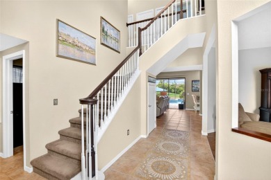 LOCATED ON THE 4TH HOLE IN THE GOLF COURSE COMMUNITY OF on Summerfield Crossing Golf Club in Florida - for sale on GolfHomes.com, golf home, golf lot