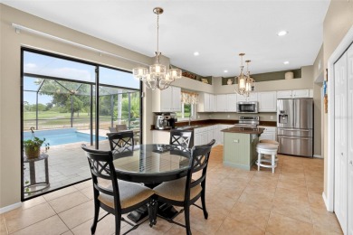 LOCATED ON THE 4TH HOLE IN THE GOLF COURSE COMMUNITY OF on Summerfield Crossing Golf Club in Florida - for sale on GolfHomes.com, golf home, golf lot