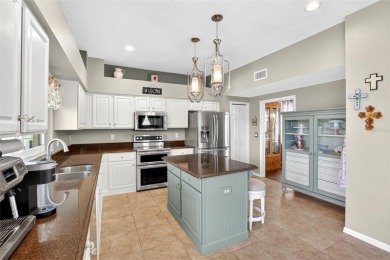 LOCATED ON THE 4TH HOLE IN THE GOLF COURSE COMMUNITY OF on Summerfield Crossing Golf Club in Florida - for sale on GolfHomes.com, golf home, golf lot