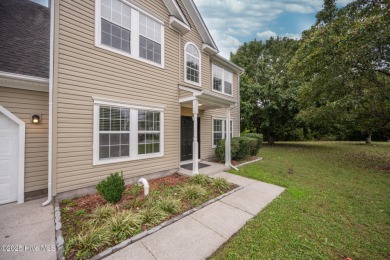 Welcome Home! This beautiful 4-bedroom, 2.5-bath home offers on Eagle Creek Golf Club and Grill in North Carolina - for sale on GolfHomes.com, golf home, golf lot