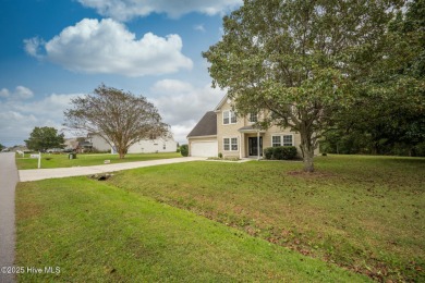 Welcome Home! This beautiful 4-bedroom, 2.5-bath home offers on Eagle Creek Golf Club and Grill in North Carolina - for sale on GolfHomes.com, golf home, golf lot