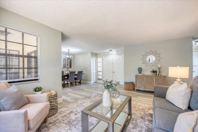Beautifully renovated villa with private backyard view in Sutton on Highland Lakes Executive Golf Course in Florida - for sale on GolfHomes.com, golf home, golf lot
