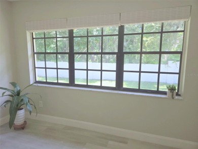 Beautifully renovated villa with private backyard view in Sutton on Highland Lakes Executive Golf Course in Florida - for sale on GolfHomes.com, golf home, golf lot