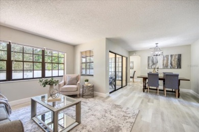 Beautifully renovated villa with private backyard view in Sutton on Highland Lakes Executive Golf Course in Florida - for sale on GolfHomes.com, golf home, golf lot