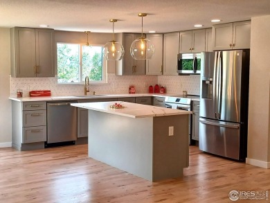 Location, views and updated finishes, this home has it all! on Sunset Golf Course in Colorado - for sale on GolfHomes.com, golf home, golf lot