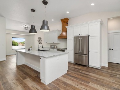 BACKING UP TH THE 11TH FAIRWAY OF DESERT HAWK GOLF COURSE THIS on Desert Hawk At Pueblo West in Colorado - for sale on GolfHomes.com, golf home, golf lot